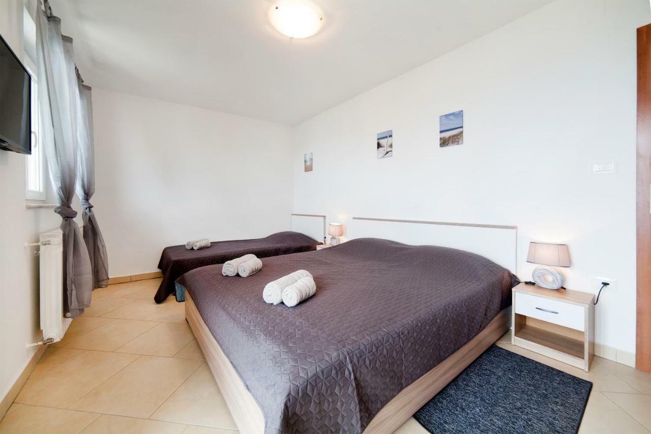 Apartmani Sandra Rovini Moscenice Bagian luar foto